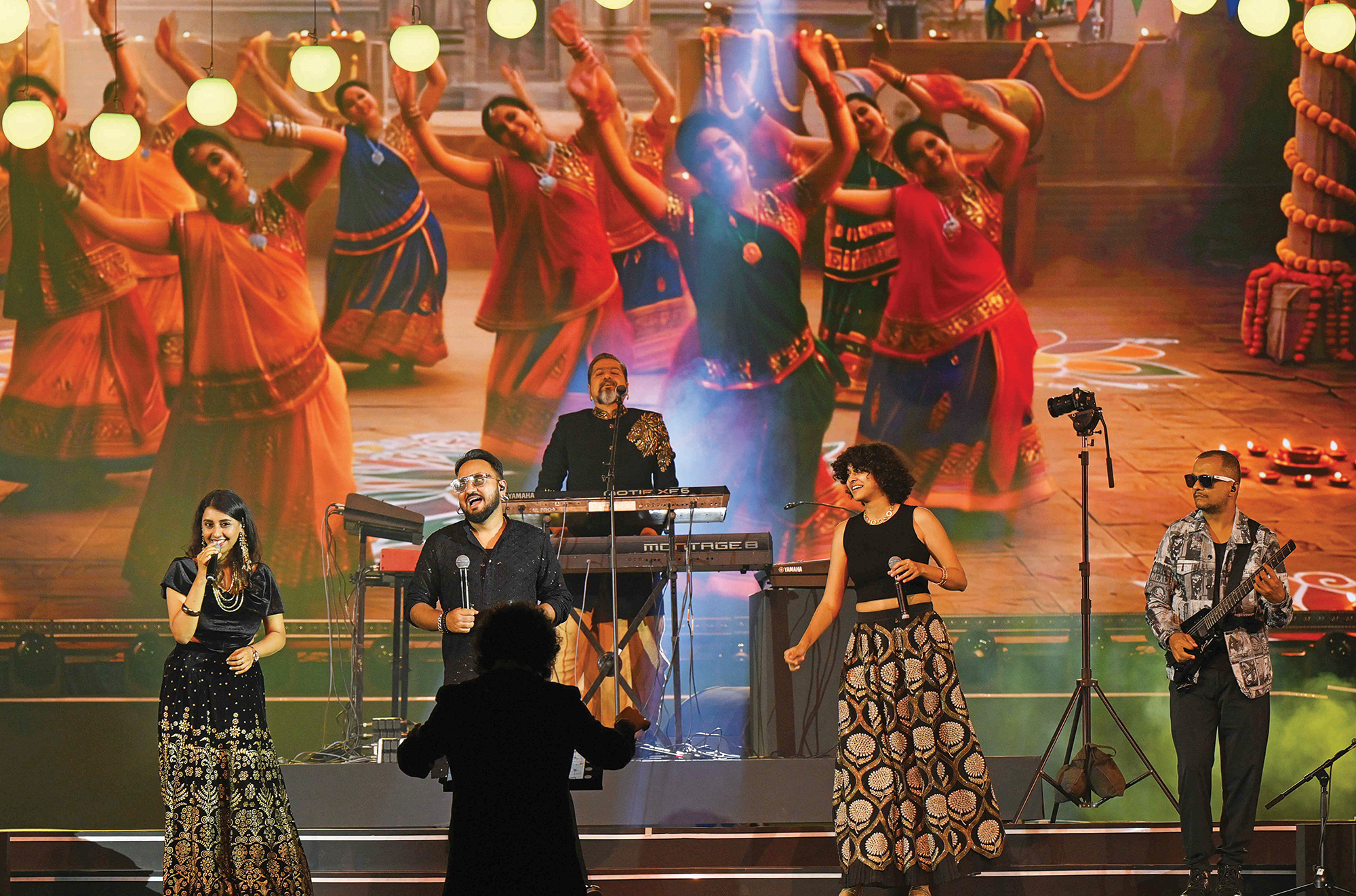 Ricky Kej and his troupe performing a musical symphony for the Bajaj Group