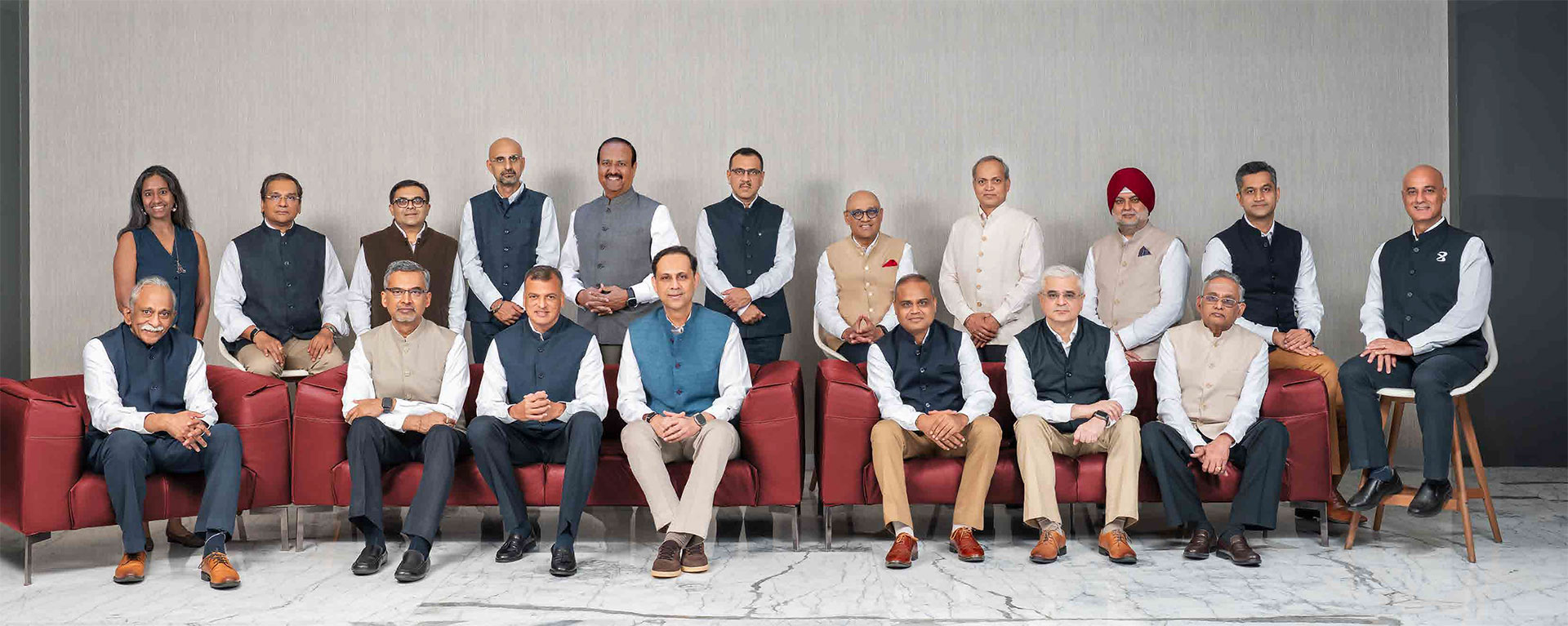 Bajaj Finance leadership team seated and standing together